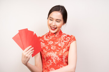 Chinese new year festival celebrate culture of china people, cheerful asian young woman, girl hand holding red envelope, ang pao ,wearing red cheongsam dress traditional. Isolated on white background.