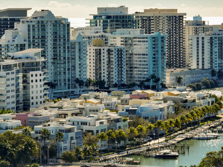 Fototapeta premium Aerial drone photo of townhomes and highrise condominiums in Miami Beach