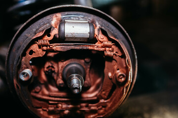 copper grease on the brake mechanisms of a car drum brake.