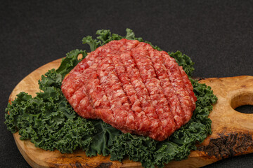 Raw beef burger cutlet for cooking