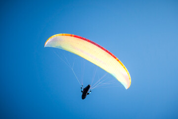 paragliding flight in the mountains. Le Grand-Bornand, France