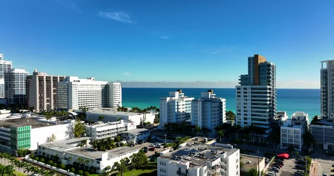 Aerial Miami Beach rising reveal condos and beach 4k dci 60fps