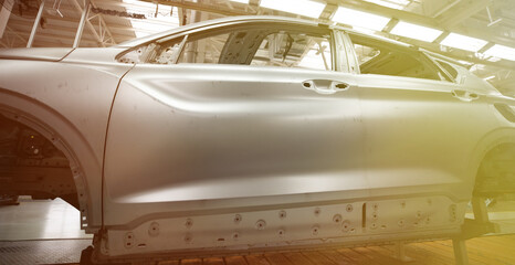 Car manufacturing plant, car body after welding line........