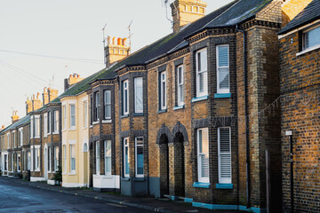 Fototapeta premium A row of red brick terrace houses in Kent, UK.