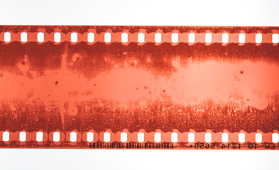 Color 35mm film negative photo, scratch film strip , Cinema filmstrip roll on white background. as...