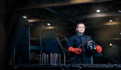 Banner Portrait beautiful woman welder background industry factory workplace