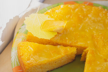 Sweet orange pumpkin baked pie in autumn