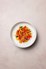 Rice with fried chicken, pepper and sesame. Asian food.