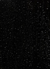 white raindrops on the window against the background of the night sky
