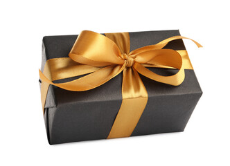 Beautiful gift box with golden ribbon and bow on white background