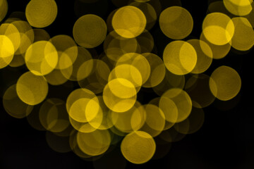Elegant and romantic golden Christmas lights background with bokeh