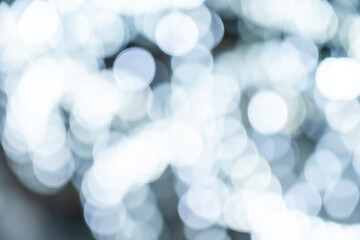 Elegant and romantic white Christmas lights background with bokeh