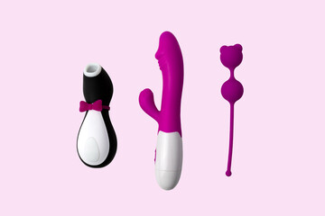 sex shop toys on pink background