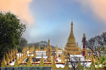 Golden pagodas and temples on sagaing hill, a 240 metres (790 ft) hill with many pagodas and monasteries located to the northeast of the city centre of Mandalay (Burma)
