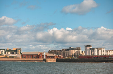 Fototapeta premium On this trip, while in Edinburgh, Scotland, one of the greatest locations for sightseeing, for both locals and tourists, is at New Haven Lighthouse at Lighthouse Point in New Haven