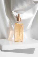 container bottle product of golden extract cream lotion, medical skincare facial, branding mockup...