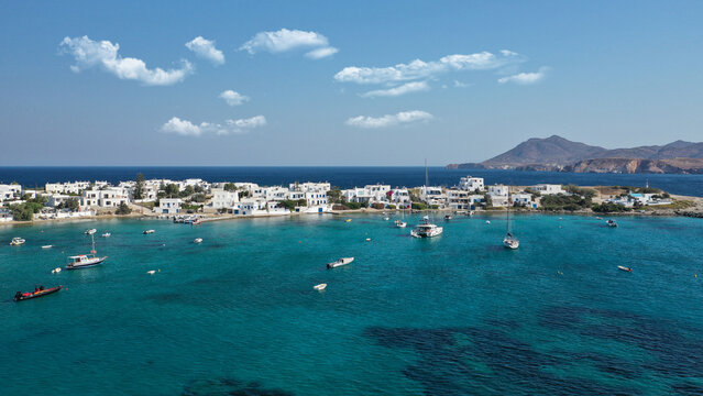Aerial drone photo of picturesque Pollonia a quiet, family -friendly village on the north-east corner of Milos island, Cyclades, Greece