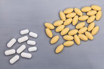 oval-shaped tablets lie on a contrasting background