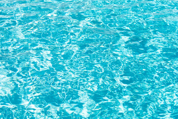 Blue ripped water in swimming pool, water pool texture and surface water backgraund.