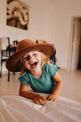 little child in cowboy hat