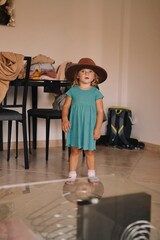 little child in cowboy hat
