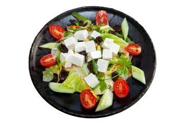 Mediterranean salad on a black plate