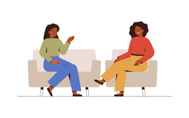 Two women sit on the couches and  talk about something.  Female host listening to her guest story-telling. Psychotherapist has a session with her patient.  Business interview and Conversation concept. - 482705928