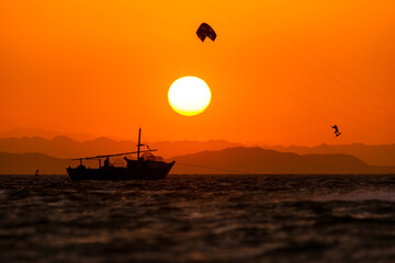 Sunset kiteboarding