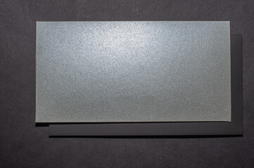 gray, silver envelope on a black flat background, luxury corporate identity and corporate identity design