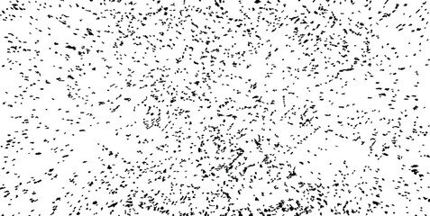 Small uneven spots and particles of debris. Abstract vector texture. Distressed uneven background. Grunge texture overlay with fine grains isolated on white background. Vector illustration. EPS10.