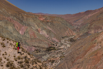 Fototapeta na wymiar Person contemplating the landscape of mountains in northern Argentina