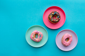 Vibrant color homemade kid decorated doughnuts