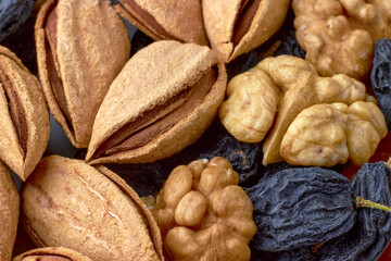 Dried fruits of zucats and nuts are posted on the table
