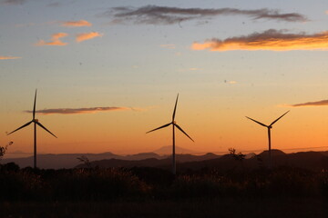 wind turbine at sunset