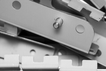 Close up shot of galvanized metal brackets with metal pin