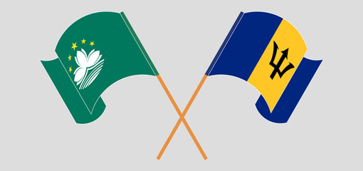 Crossed and waving flags of Macau and Barbados