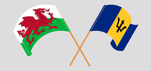 Crossed and waving flags of Wales and Barbados
