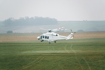 G-ETPP ETPS AgustaWestland AW139 helicopter landing on grass conducting pilot training flight exercise