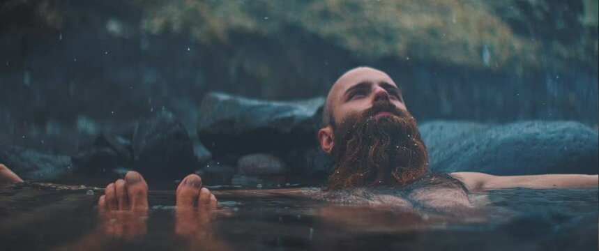 Man readjusts in hot spring 