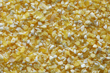 uncooked coarse cornmeal close up background top view