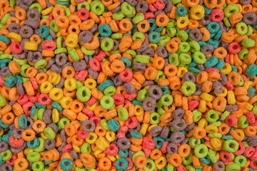 Sweet multicolored flakes, cereal loops.