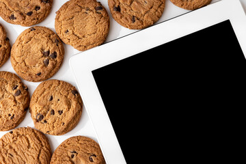 タブレット端末とクッキー。デジタルデバイスのCookieイメージ