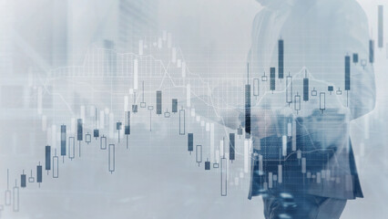 Analysis concept. Financial graph on city scape background double exposure
