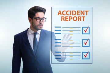 Businessman pressing buttons on virtual accident report