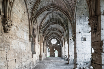 The gothic cloisters inside the crusader castle of Krak Des Chevaliers, Syria - obrazy, fototapety, plakaty