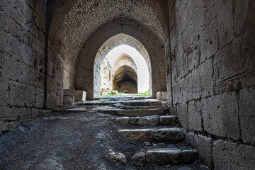 Fototapeta The gothic cloisters inside the crusader castle of Krak Des Chevaliers, Syria obraz