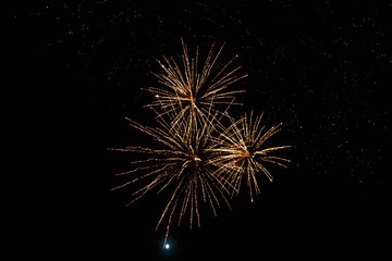 Very beautiful fireworks against the black sky. Graphic resource for design. Underlay or undercoat