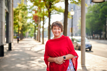 WASHINGTON, DC, USA - OCTOBER 16TH 2021: A middle-aged woman with short haircut  is on a city break...