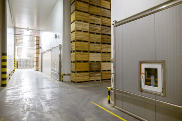 A fridges airless storage vegetables or fruits. Production facilities of large warehouse - grading, packing and storage of crops.