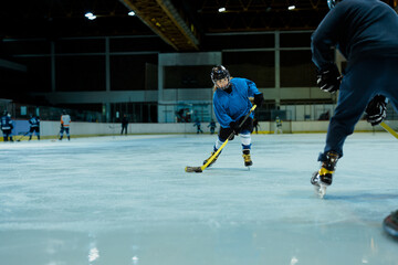 Ice Hockey Player Scoring on rink
